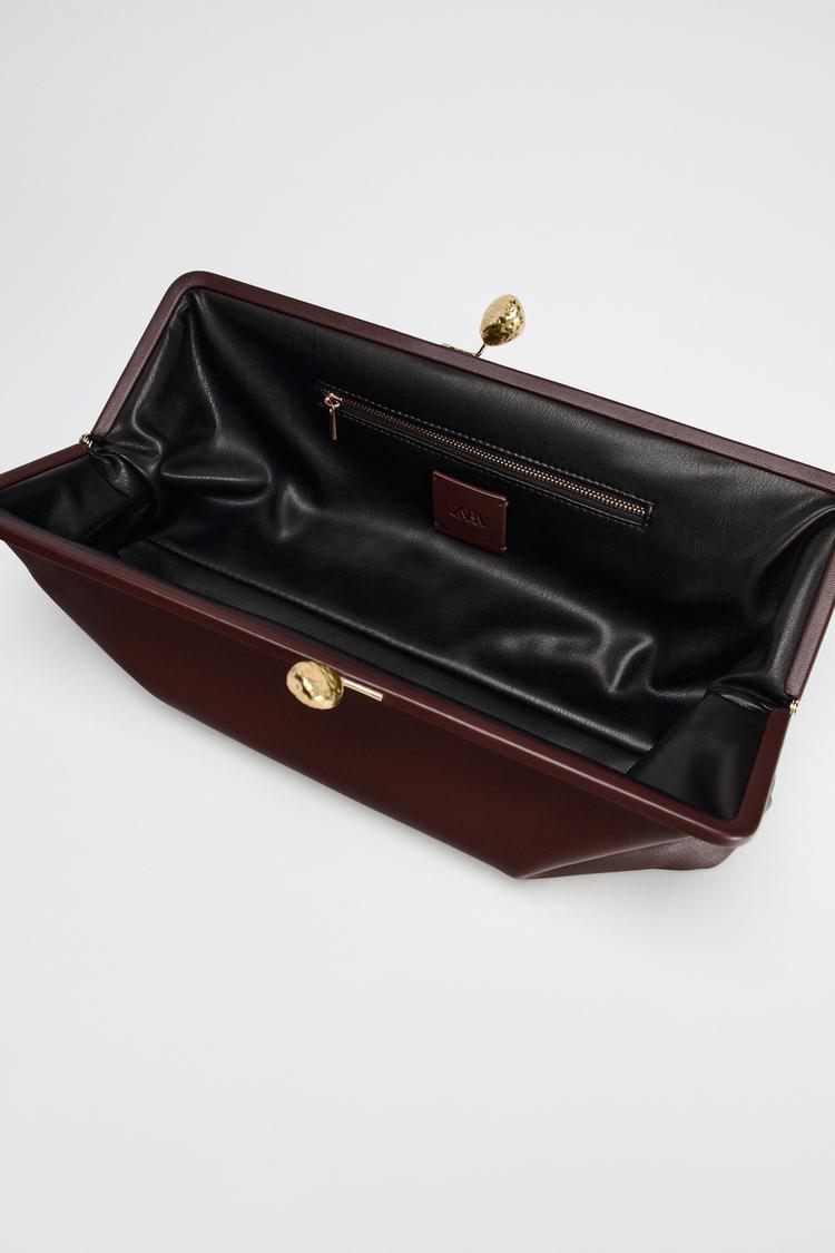 LEATHER CLUTCH BAG WITH METAL DETAIL - CITRIC 